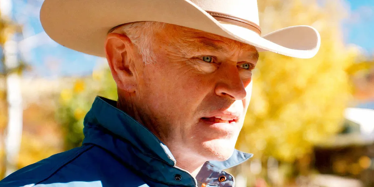 Neal McDonough looking scared while wearing a cowboy hat in Homestead 2024