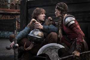 How To Train Your Dragon Live-Action Remake Image Sees Hiccup & Astrid Hiding In Training Arena