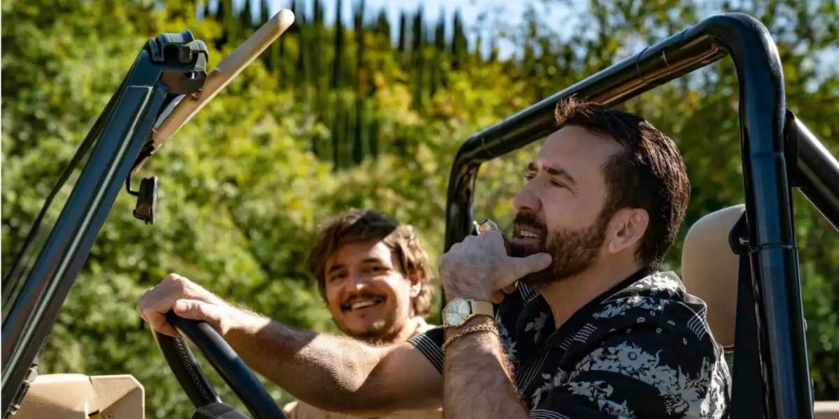NIck Cage and Javi driving in The Unbearable Weight Of Massive Talent (2022)