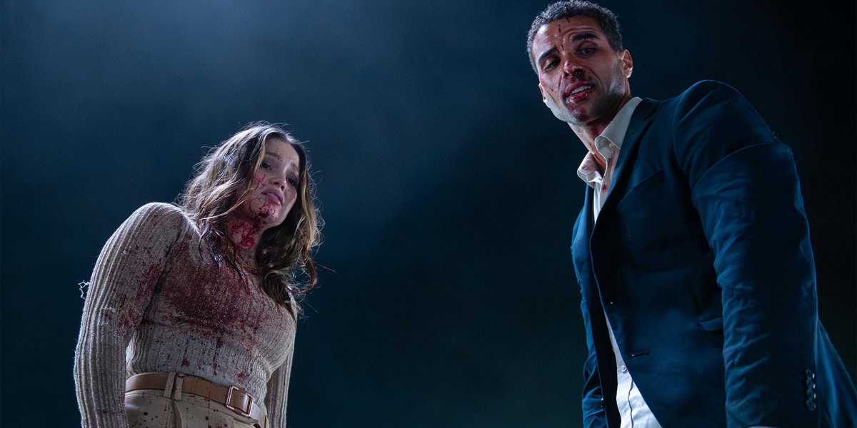 "I'm A Big Scaredy Cat": New Slasher Movie's Killer Reveal Actually Scared Horror Movie Veterans And Heart Eyes Stars Mason Gooding & Olivia Holt