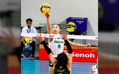 <p><strong>GOOD START.</strong> College of Saint Benilde's Jhasmin Gayl Pascual against Philippine Army's Audrey Kathryn Paran during the PNVF Champions League at the Rizal Memorial Sports Complex on Monday (Feb. 5, 2024). Saint Benilde escaped a 16-25, 25-16, 25-27, 25-14, 15-9 victory to kick off its campaign on the right note. <em>(PNVF photo)</em></p>