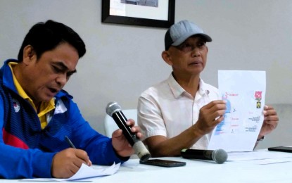 <p><strong>MANILA MARATHON</strong>. Manila International Marathon founding president and organizer Dino Jose (right) discusses the upcoming race during the Tabloids Organization in Philippine Sports, Inc. (TOPS) “Usapang Sports” forum at the Rizal Memorial Coliseum VIP room on Jan. 25, 2024. With him is TOPS secretary general Edwin Rollon. <em>(PNA photo by Jean Malanum)</em></p>