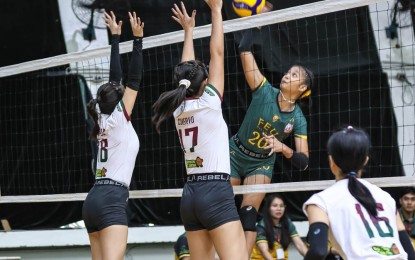 <p><strong>GIRL'S VOLLEYBALL.</strong> Far Eastern University's Sofia Ona tries to score against University of the Philippines Integrated School's Khloe Long and Natalie Cuervo in Division 1 of the 2025 Shakey’s Girls Volleyball Invitational League Rising Stars Cup on Wednesday (May 28, 2025) at the La Salle Green Hills gym. FEU won, 25-9, 25-12. <em>(Contributed photo)</em></p>