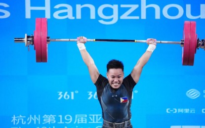 <p><strong>OLYMPICS-BOUND.</strong> Elreen Ann Ando at the 2022 Asian Games in Hangzhou, China. Ando and fellow Cebuano John Febuar Ceniza have qualified for the Paris Olympics in July. <em>(Contributed photo)</em></p>
