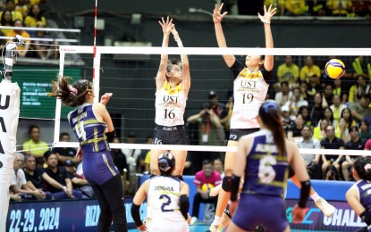 <p><strong>POWER.</strong> National University's Michaela Belen (No. 4) smashes for a point against University of Santo Tomas during the opener of the UAAP Season 86 women's volleyball best-of-three finals at Smart Araneta Coliseum in Cubao, Quezon City on Saturday (May 11, 2024). NU won, 25-23, 25-20, 25-20, and will seek to close out the season in Game 2 at Mall of Asia Arena in Pasay on Wednesday (May 15). <em>(PNA photo by Jess M. Escaros Jr.) </em></p>