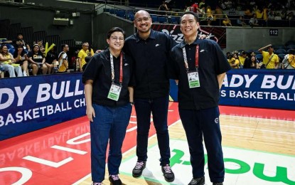 <p><strong>COMMISSIONER’S TEAM.</strong> The UAAP Basketball commissioner Xavier Nunag (center) and deputy commissioners lawyers Mariana Lopa (left) and Marvin Bienvenida in this file photo. The UAAP Basketball Commissioner’s Team on Wednesday (Jan.15, 2025) vowed to continue enhancing tournament operations for the second semester to ensure the highest standards of officiating and game management across all basketball division tournaments. <em>(Photo courtesy of UAAP)</em></p>