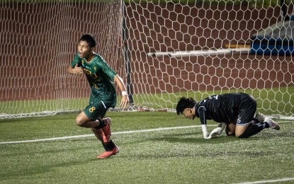 <p><strong>SHOUT FOR JOY. J</strong>erriemy Biton (No. 8) of Far Eastern University-Diliman reacts after delivering a goal during the game against De La Salle-Zobel in the UAAP Season 87 boys' football tournament on Saturday (March 8, 2025) at UP Diliman Stadium in Quezon City. FEU-D won, 2-0.<em> (UAAP photo)</em></p>
