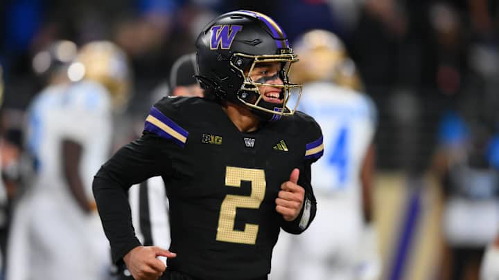 Nov 15, 2024; Seattle, Washington, USA; Washington Huskies quarterback Demond Williams Jr. (2) smiles after throwing a touchdown against the UCLA Bruins during the second half at Alaska Airlines Field at Husky Stadium. Mandatory Credit: Steven Bisig-Imagn Images Nov 15, 2024; Seattle, Washington, USA; Washington Huskies quarterback Demond Williams Jr. (2) smiles after throwing a touchdown against the UCLA Bruins during the second half at Alaska Airlines Field at Husky Stadium. Mandatory Credit: Steven Bisig-Imagn Images