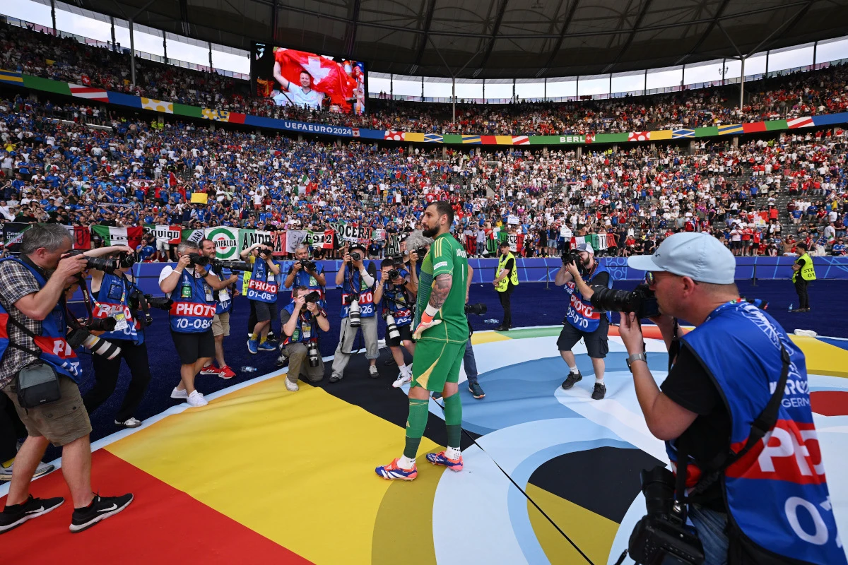 BERLIN, GERMANY - JUNE 29: Gianluigi Donnarumma of Italy, looks dejected after the team's elimination from the tournament following the UEFA EURO 2024 round of 16 match between Switzerland and Italy at Olympiastadion on June 29, 2024 in Berlin, Germany. (Photo by Stu Forster/Getty Images)
