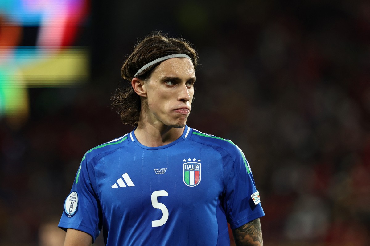 Italy defender #05 Riccardo Calafiori looks on during the UEFA Euro 2024 Group B football match between Italy and Albania at the BVB Stadion in Dortmund on June 15, 2024. (Photo by FRANCK FIFE / AFP) (Photo by FRANCK FIFE/AFP via Getty Images)
