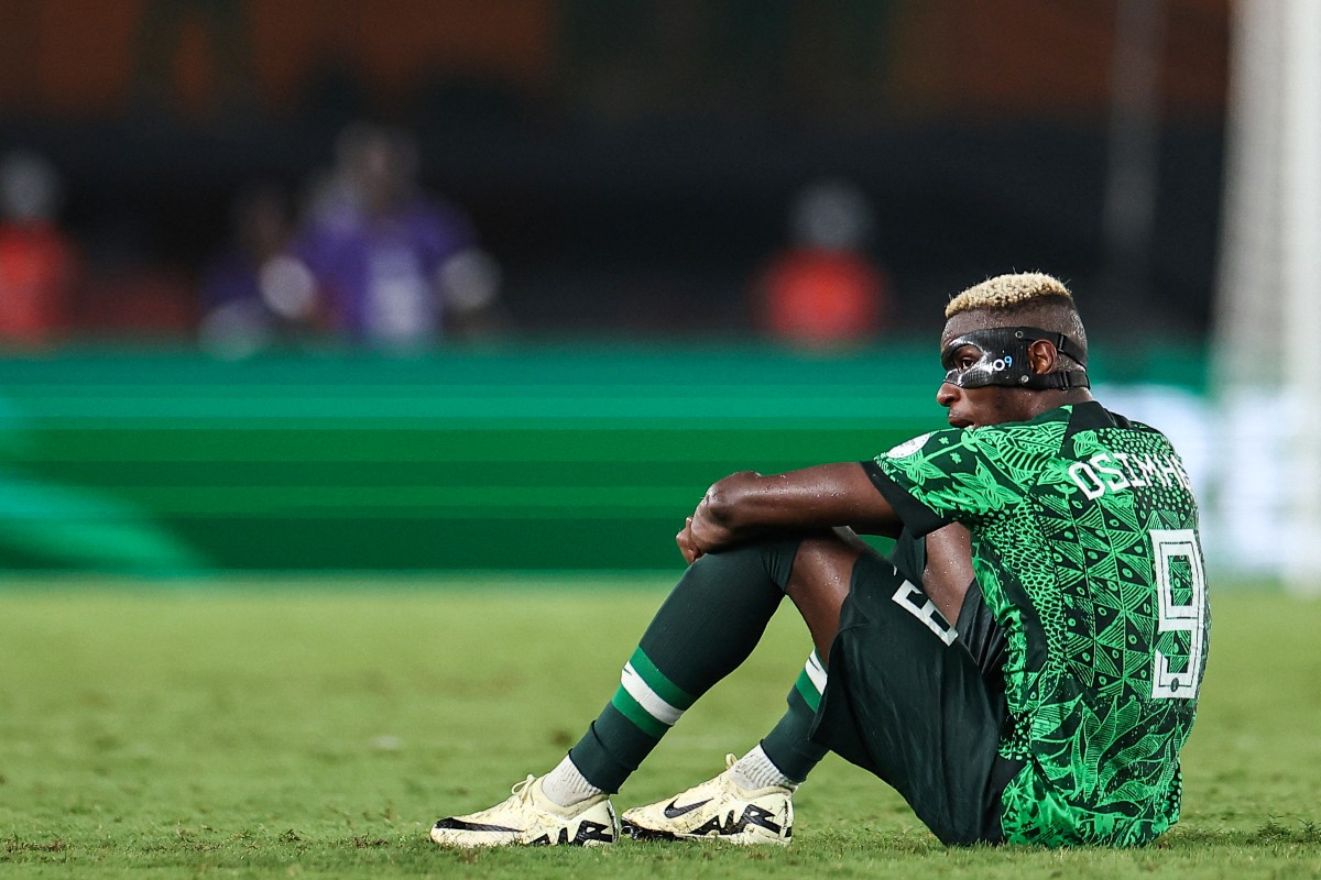 Nigeria's forward #9 Victor Osimhen reacts during the Africa Cup of Nations (CAN) 2024 quarter-final football match between Nigeria and Angola at the Felix Houphouet-Boigny Stadium in Abidjan on February 2, 2024. (Photo by FRANCK FIFE / AFP) (Photo by FRANCK FIFE/AFP via Getty Images)