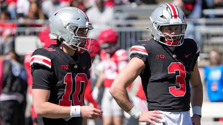 Ohio State Buckeye quarterbacks Julian Sayin (10) and Lincoln Kienholz (3) warm up before the start of the spring game at Ohio Stadium on April 12, 2025. Ohio State Buckeye quarterbacks Julian Sayin (10) and Lincoln Kienholz (3) warm up before the start of the spring game at Ohio Stadium on April 12, 2025.