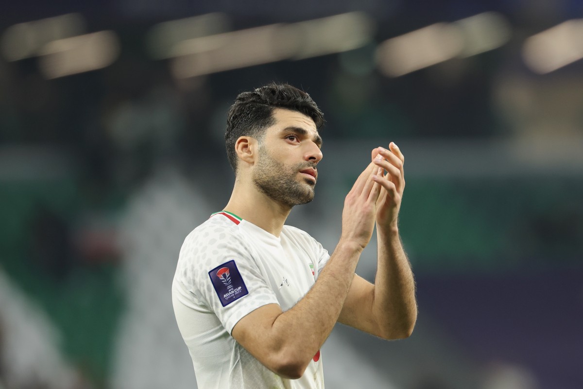 Inter AL RAYYAN, QATAR - JANUARY 23: Mehdi Taremi of Iran celebrates scoring his team's second goal during the AFC Asian Cup Group C match between Iran and United Arab Emirates at Education City Stadium on January 23, 2024 in Al Rayyan, Qatar. (Photo by Lintao Zhang/Getty Images)