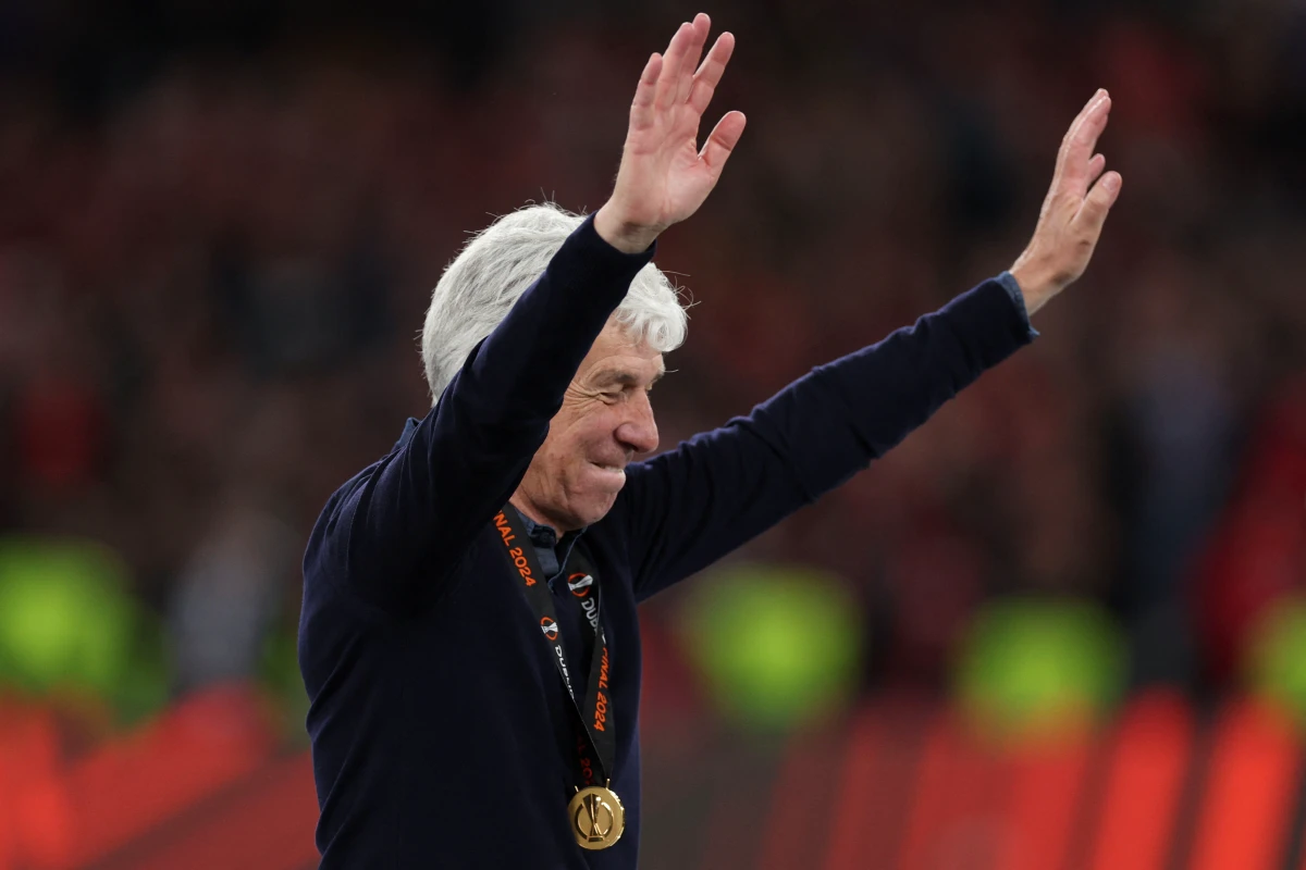 Atalanta coach Gian Piero Gasperini celebrates after winning the UEFA Europa League final football match between Atalanta and Bayer Leverkusen at the Dublin Arena stadium, in Dublin, on May 22, 2024. (Photo by Adrian DENNIS / AFP) (Photo by ADRIAN DENNIS/AFP via Getty Images)