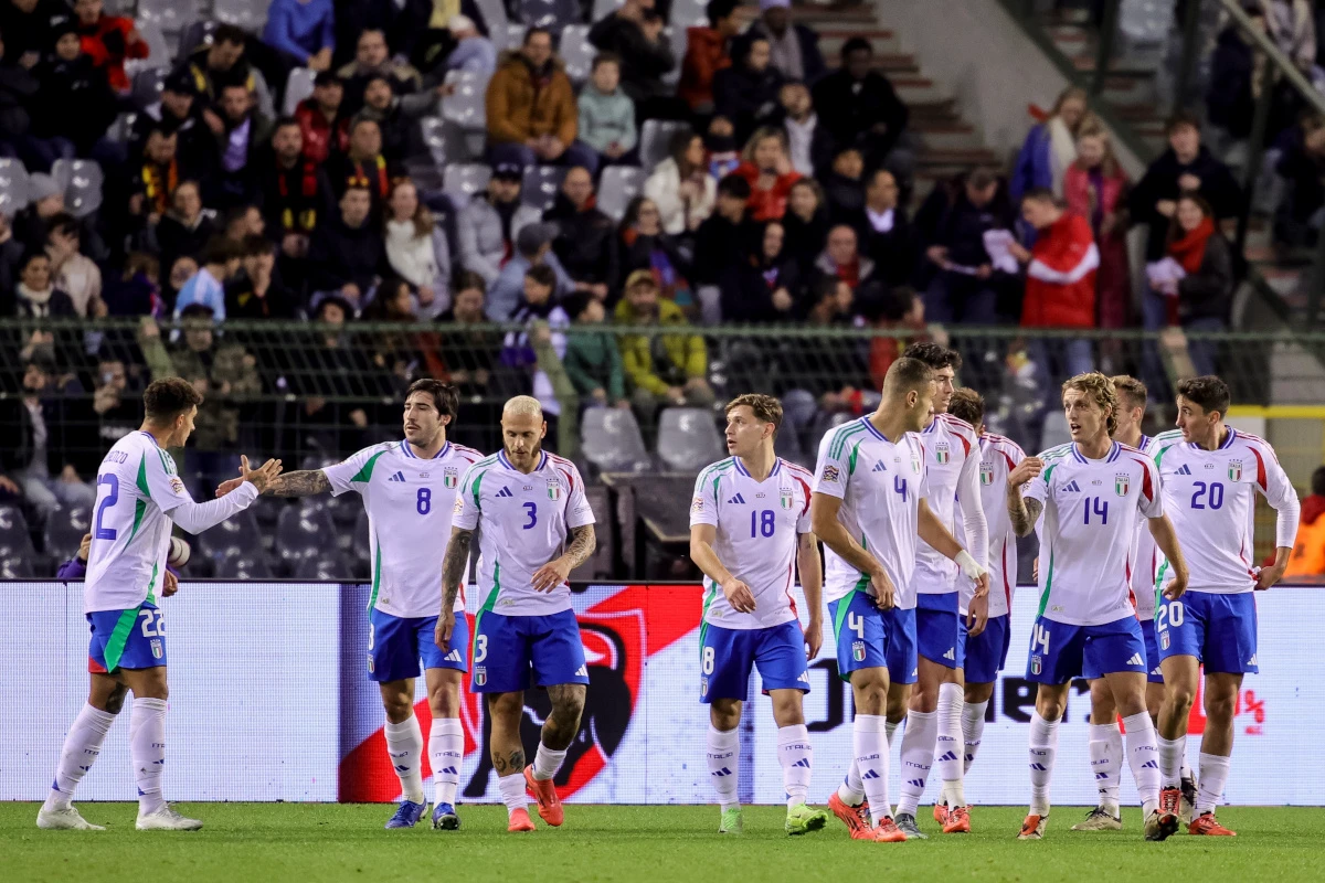 epa11721515 Players of Italy celebrate after scoring the 0-1 goal during the UEFA Nations League soccer match between Belgium and Italy in Brussels, Belgium, 14 November 2024. EPA-EFE/OLIVIER MATTHYS