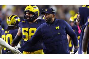 Michigan Wolverines raising $5 million to find an elite quarterback