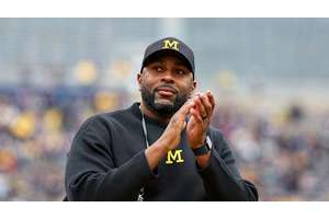 Why did Michigan Suspend Sherrone Moore?