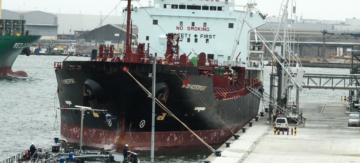 A cargo ship moored at a port in Europe. A cargo ship moored at a port in Europe.
