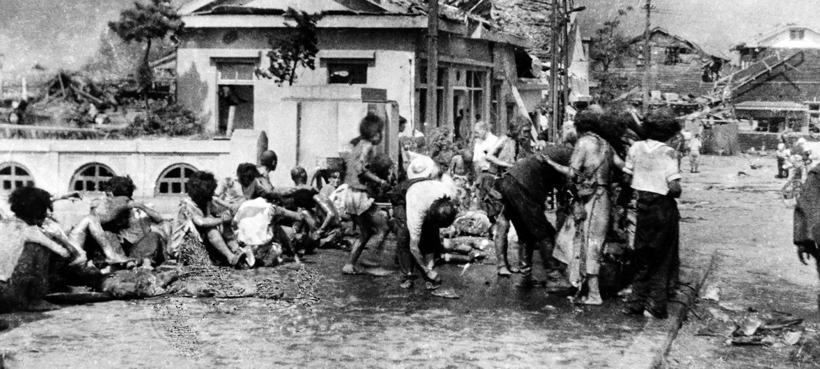 Injured civilians, having escaped the raging inferno, gathered on a pavement west of Miyuki-bashi in Hiroshima, Japan, at about 11 a.m. on 6 August 1945. Injured civilians, having escaped the raging inferno, gathered on a pavement west of Miyuki-bashi in Hiroshima, Japan, at about 11 a.m. on 6 August 1945.