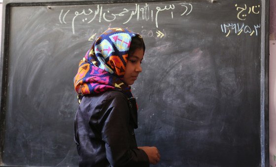 Afghanistan’s education system has been devastated by more than three decades of sustained conflict. For many of the country’s children, completing primary school remains a distant dream. Here, 10-year-old Fatima is on the board to solve a math question, Afghanistan’s education system has been devastated by more than three decades of sustained conflict. For many of the country’s children, completing primary school remains a distant dream. Here, 10-year-old Fatima is on the board to solve a math question,