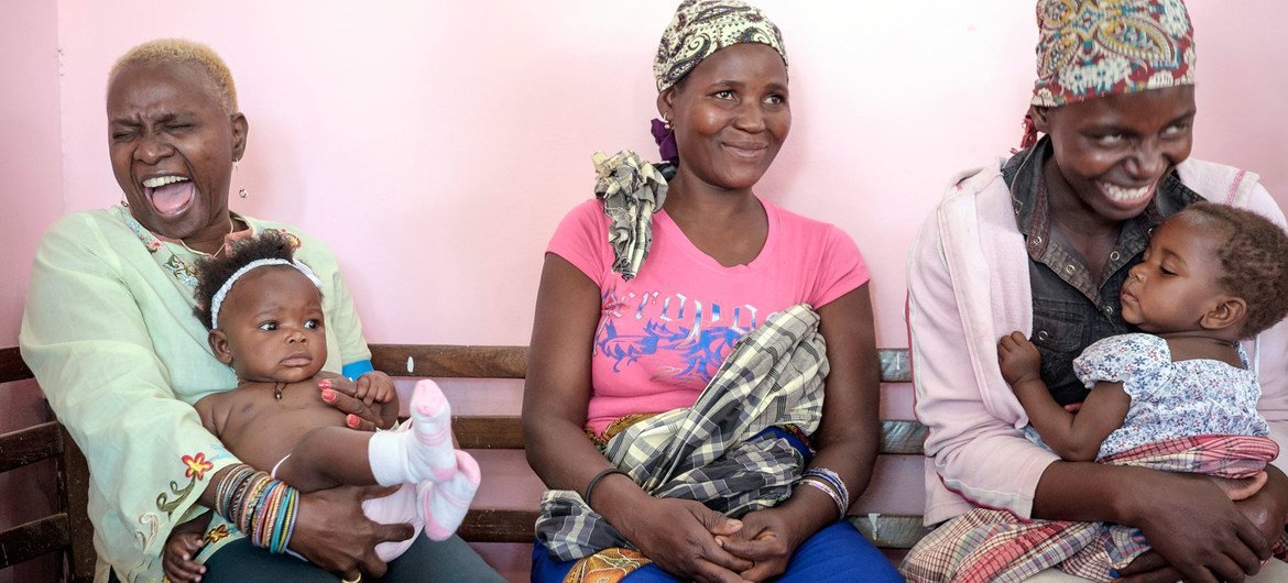 UNICEF Goodwill Ambassador Angelique Kidjo listens to mothers in Mozambique as they tell her of their dreams for their children. UNICEF Goodwill Ambassador Angelique Kidjo listens to mothers in Mozambique as they tell her of their dreams for their children.