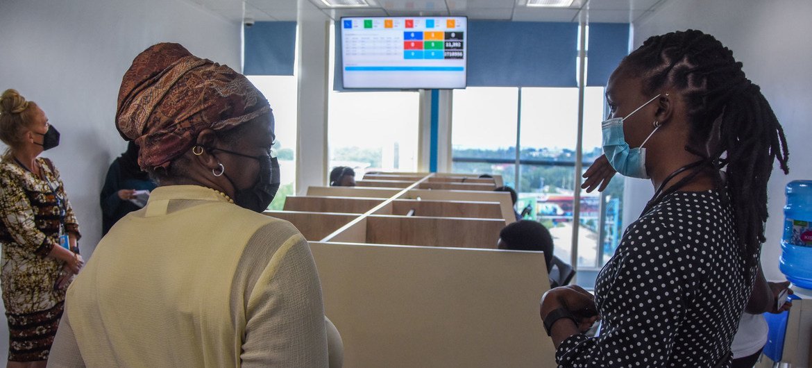 UNFPA Executive Director Dr. Natalia Kanem (left) tours the National Child Helpline head office in Dar es Salaam, Tanzania. UNFPA Executive Director Dr. Natalia Kanem (left) tours the National Child Helpline head office in Dar es Salaam, Tanzania.