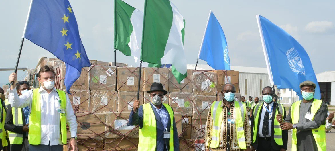 UN Resident Coordinator in Nigeria, Edward Kallon (r) receiving COVID-19 supplies at Nnamdi Azikiwe International Airport Abuja