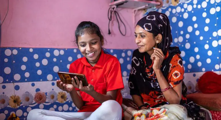 A mother helps her daughter with online studies while schools are shut during COVID-19 in India. (file) A mother helps her daughter with online studies while schools are shut during COVID-19 in India. (file)
