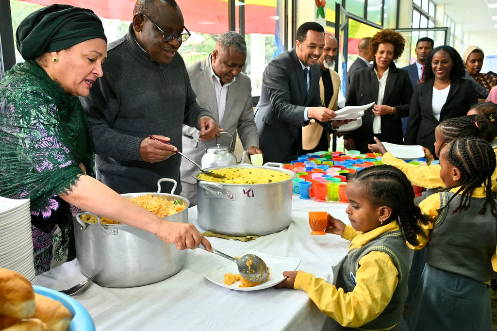 UN Deputy Secretary-General Amina Mohammed (left) serves food to children at a UN Food Systems Summit event in Addis Ababa, Ethiopia. UN Deputy Secretary-General Amina Mohammed (left) serves food to children at a UN Food Systems Summit event in Addis Ababa, Ethiopia.