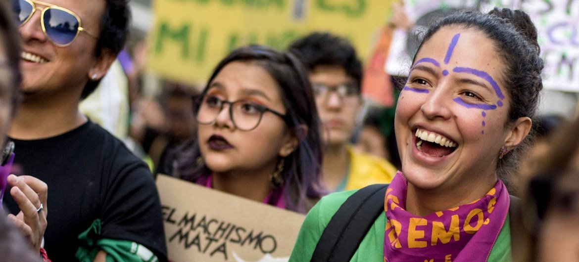 People protest in a demonstration for women's rights in Ecuador. People protest in a demonstration for women's rights in Ecuador.