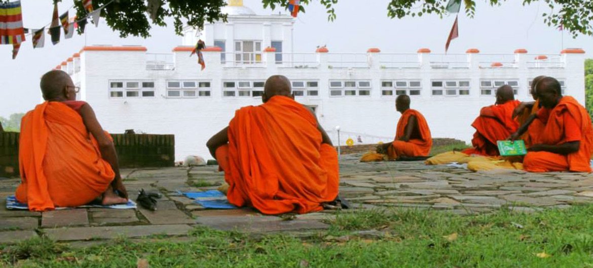 Buddhist monks meditate at the Maya Devi Temple in Lumbini, the birthplace of Lord Buddha, Nepal. Buddhist monks meditate at the Maya Devi Temple in Lumbini, the birthplace of Lord Buddha, Nepal.