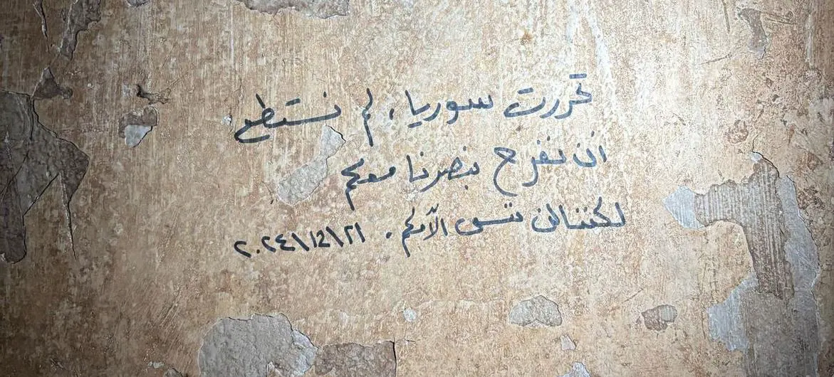 A message on the walls of Sednaya prison reads: 'Syria is free; we couldn't celebrate our victory with you, but we will not forget your pain.'