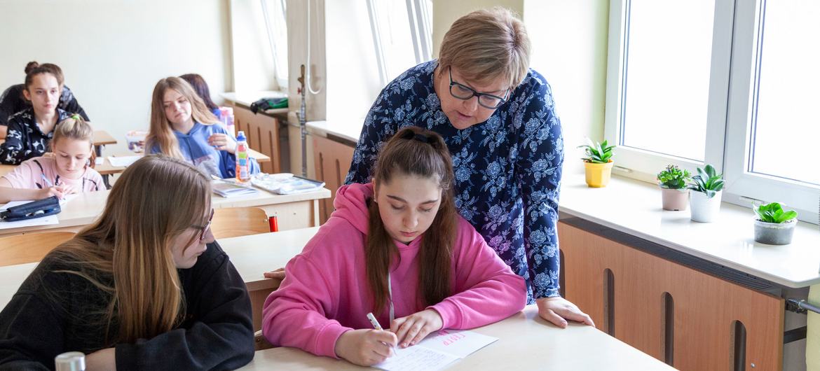 13-year-old Ukrainian refugee Sofia attends a geography class led by her teacher Ewa Golofit at Primary School no. 58 in Warsaw, Poland. 13-year-old Ukrainian refugee Sofia attends a geography class led by her teacher Ewa Golofit at Primary School no. 58 in Warsaw, Poland.