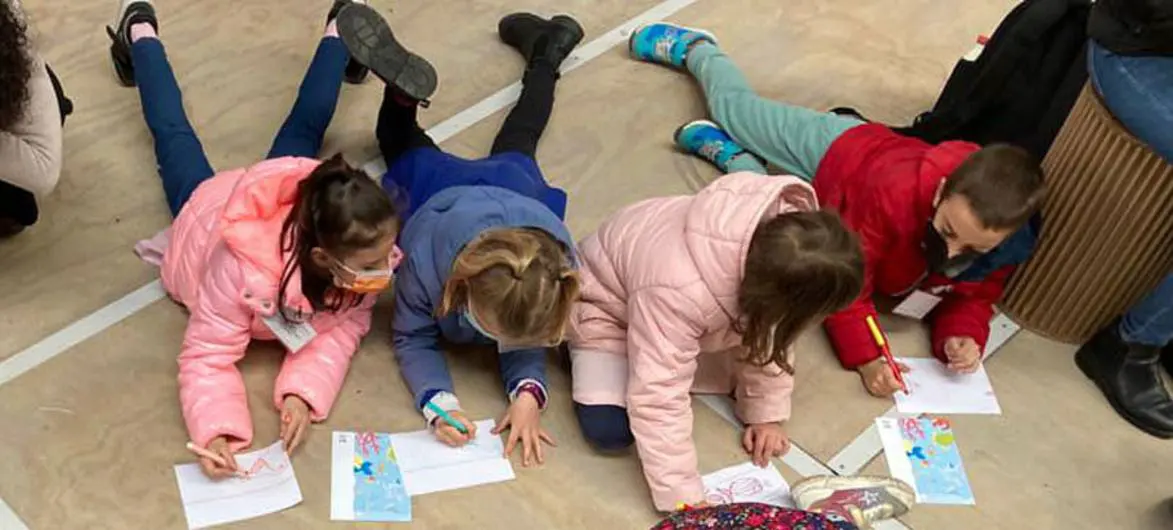 Children participate in drawing activities at an ocean awareness event, in Venice, Italy. Children participate in drawing activities at an ocean awareness event, in Venice, Italy.