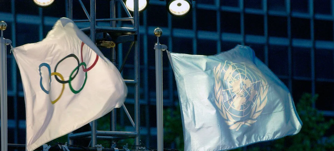 The United Nations and the Olympic flags raised at UN Headquarters. (file) The United Nations and the Olympic flags raised at UN Headquarters. (file)
