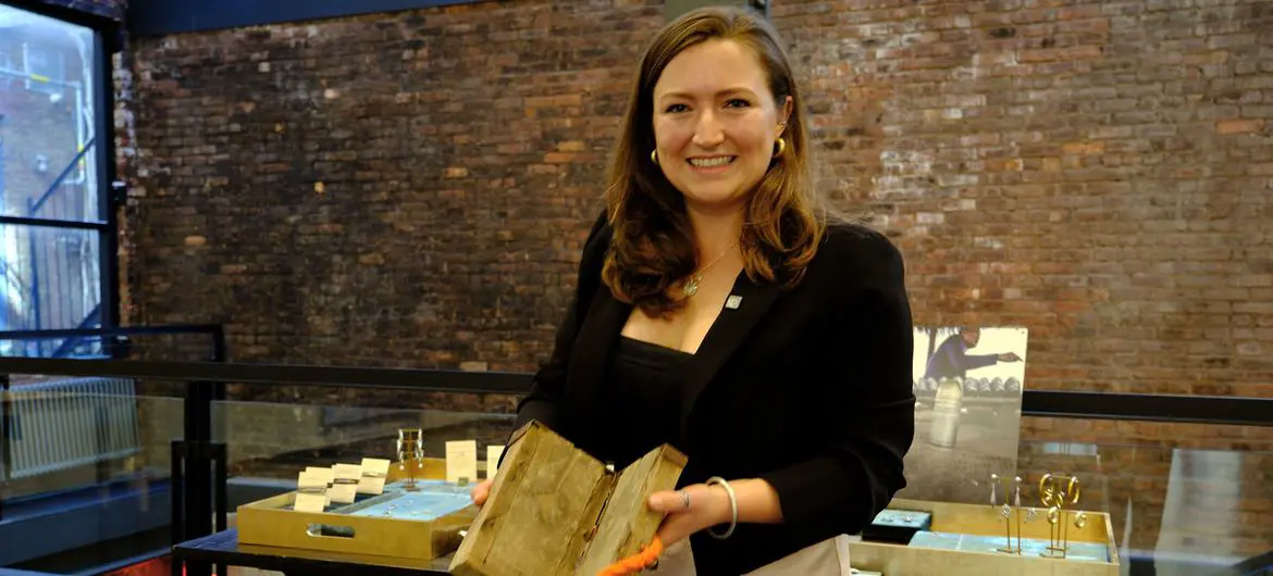 Kendall Silwonuk at an Article 22 pop-up shop in New York with an array of jewellery made of remnants of war.