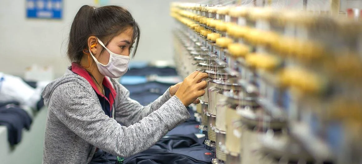 A female garment factory worker in Lao PDR.
