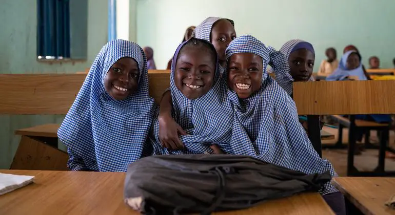 Students at a primary school in eastern Nigeria prepare await the beginning of class. Students at a primary school in eastern Nigeria prepare await the beginning of class.
