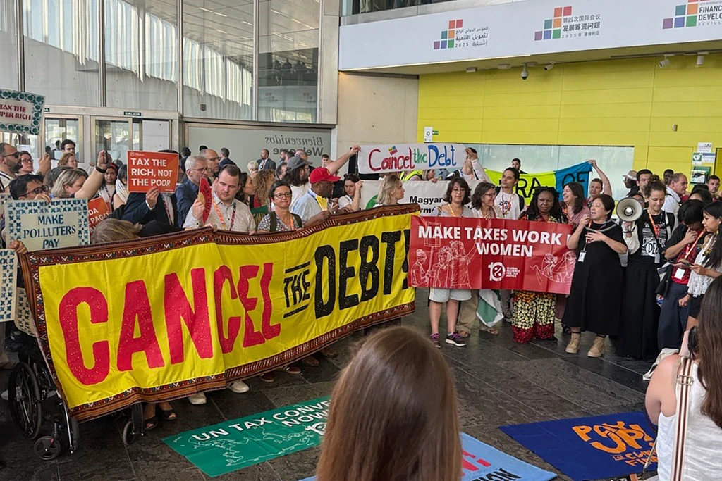 Civil society delegates voice their concerns during the final day of the 4th International Conference on Financing for Development in Sevilla, Spain.