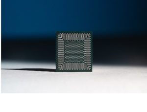 A close-up photo shows Loihi, Intel’s neuromorphic research ch a 64-Chip Neuromorphic System,
