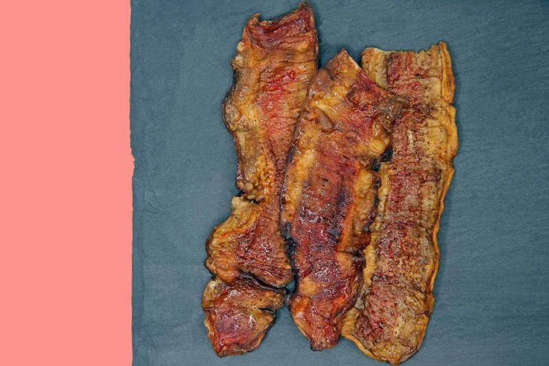 Pork-free bacon, made by slicing whole mushrooms. Credit: Atlast