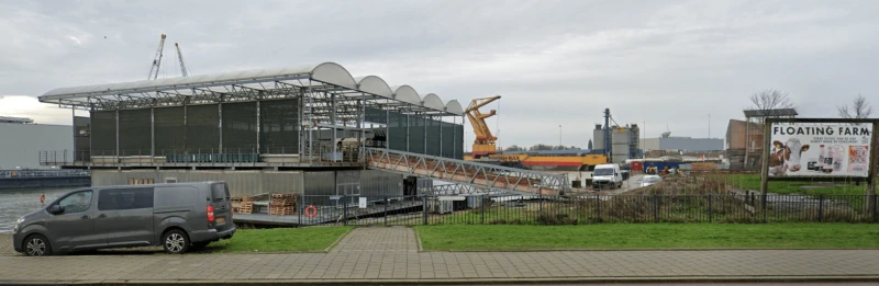 A husband-and-wife team’s experimental micro-dairy called Floating Farm can be found bobbing in the port of Rotterdam. Here 40 cows produce some 200 gallons of milk a day. Credit: Google Maps