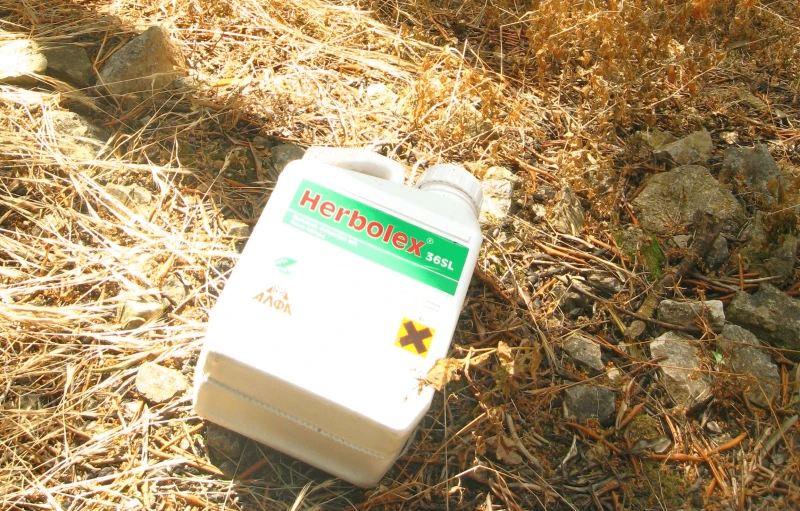 empty glyphosate herbolex container discarded in corfu olive grove empty glyphosate herbolex container discarded in corfu olive grove