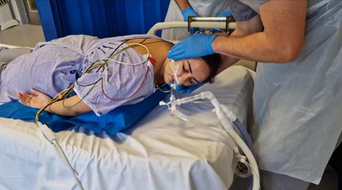 The BathMat inflatable prone repositioning device, being demonstrated with a healthy volunteer