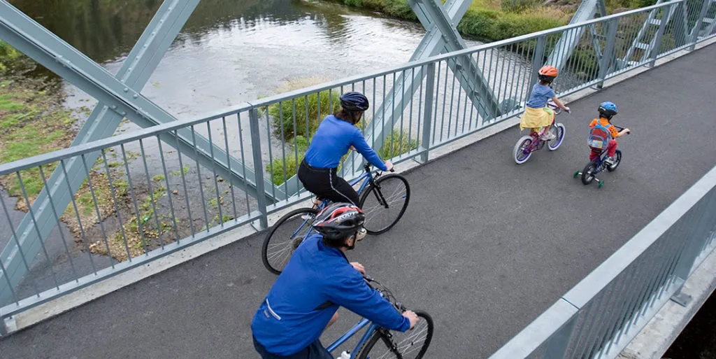 Family biking on the trail of the Coeur d'Alenes.