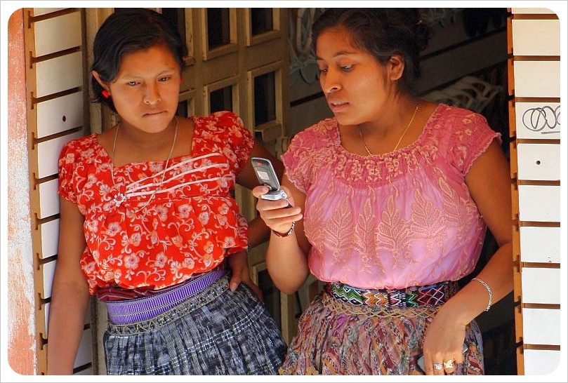 San Pedro Mayan girls with cell phone