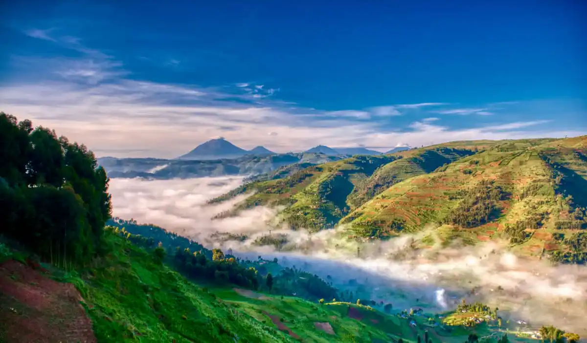The rolling, lush hills and jungles of beautiful rural Uganda