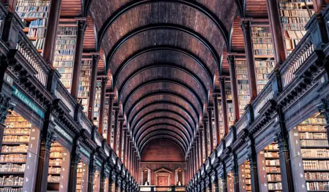 A massive and spacious historic library full of books