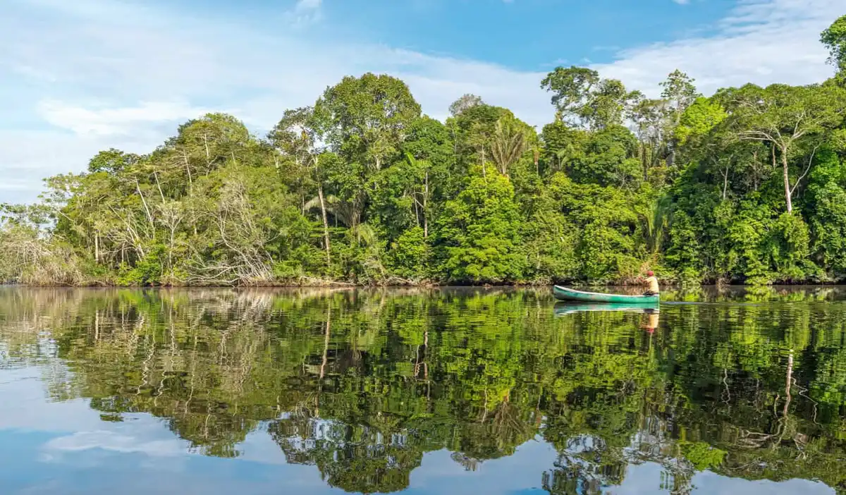 A lone canoe on the winding rivers of the Amazon in Bolivia