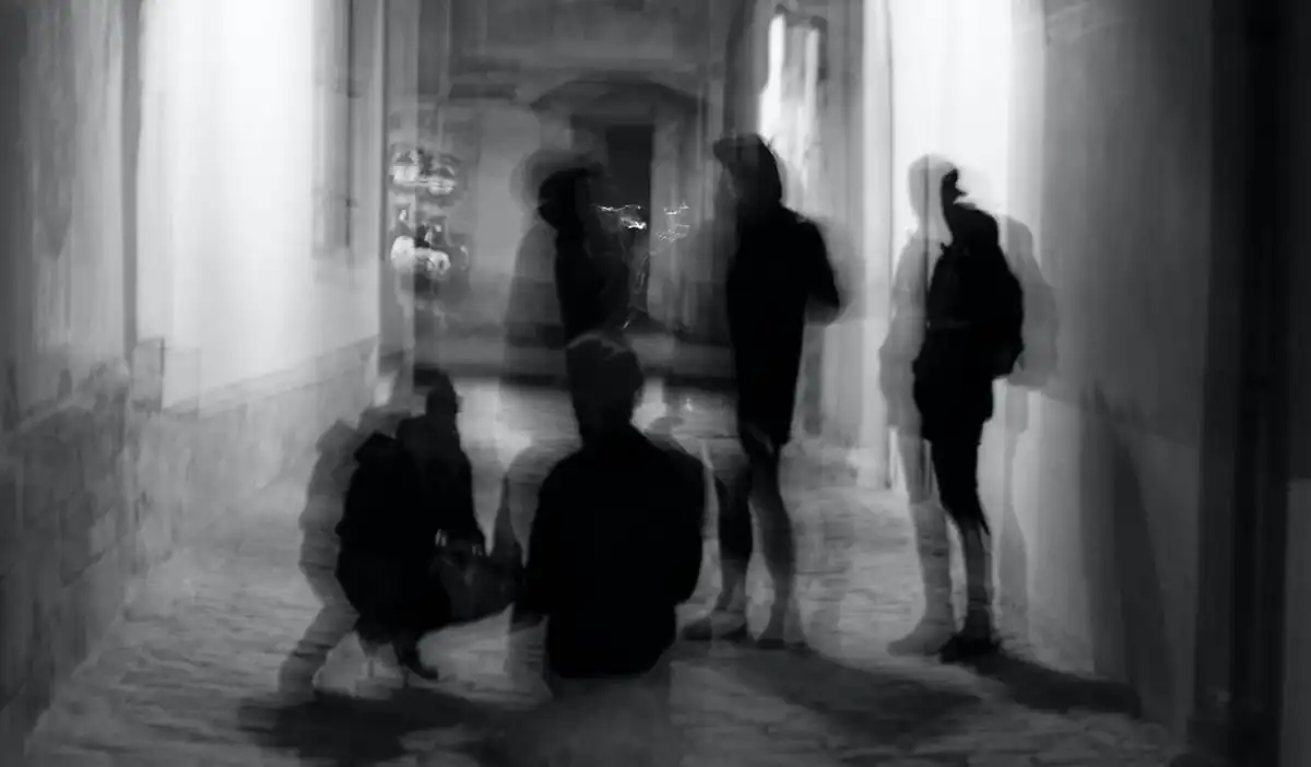 A long exposure shot making pedestrians look like ghosts